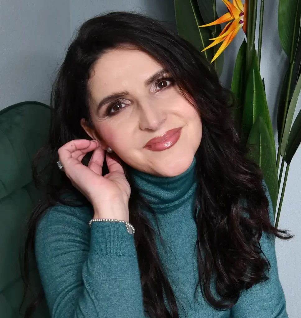 Erster Plan der Morena Tigano Vordergrundbild von Morena Tigano mit einem Lächeln.